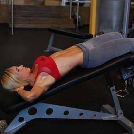 Weighted incline bench crunch