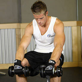 Seated Dumbbell Palms-Down Wrist Curl