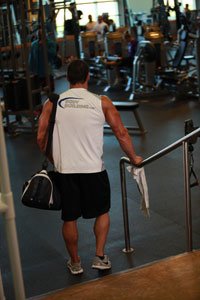 There Are A Variety Of Different Types Of People Training At The Gym.