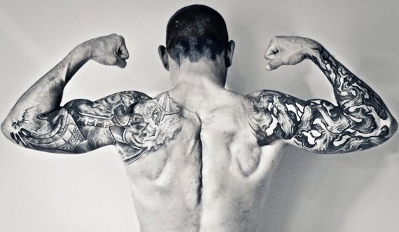 Muscles really bring out the tats!