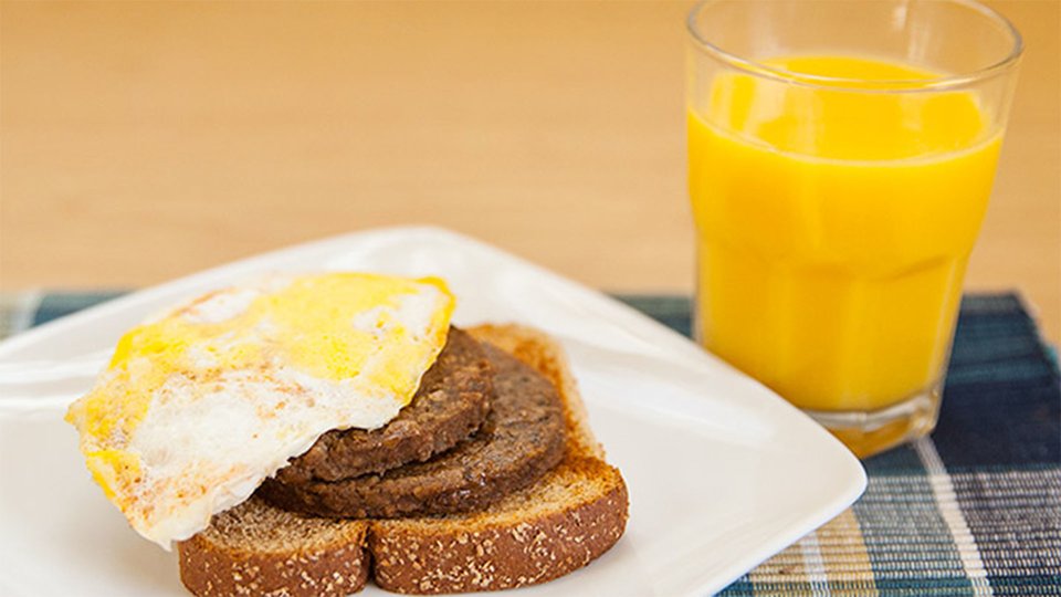 Sausage and Egg Sandwich with OJ