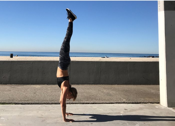 While learning to kick your legs up into a handstand, go slowly! 