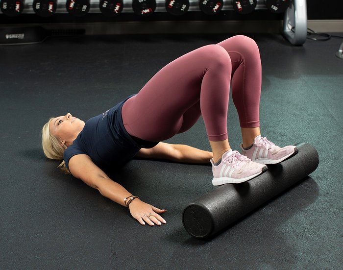 Keep your arms by your side as you squeeze your glutes to lift your... 