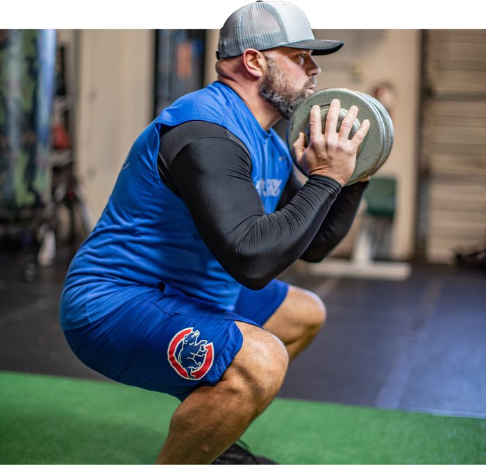 Chad Belding performing a goblet squat.