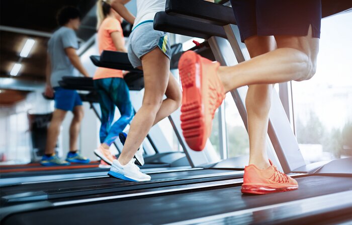 Running on a treadmill. 