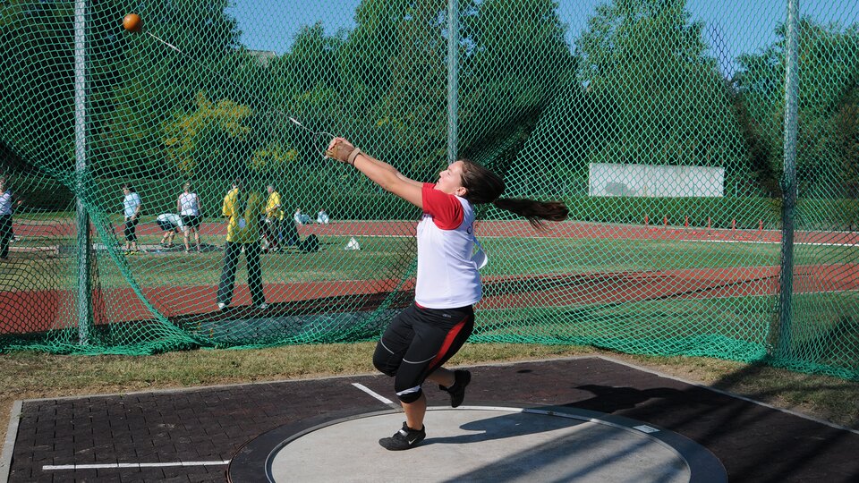 Olympic Throwers Spin into Gold