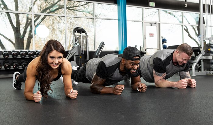 A group performing planks. 