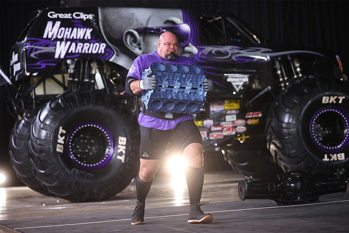 Brian Shaw carrying a heavy engine