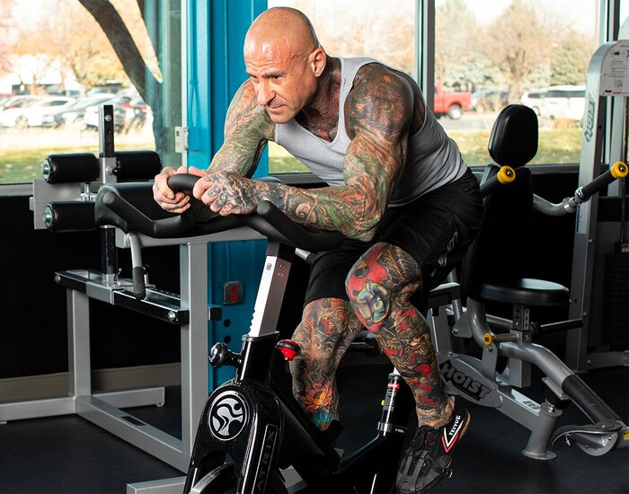 Jim Stoppani training on a stationary bike