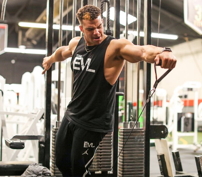 Jeremy Dutra, cable single-arm lateral raise