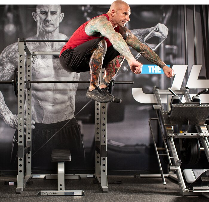 Jim Stoppani performing a high jump