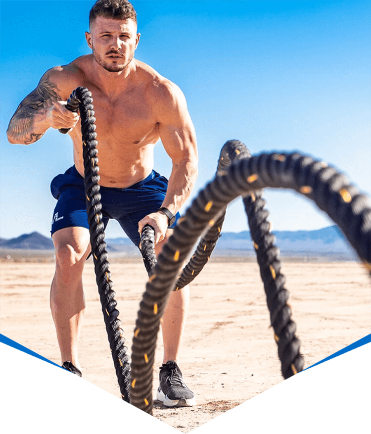 Athlete Exercising with Battle Ropes